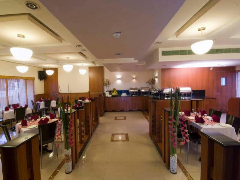 ホテル Super Townhouse Koyambedu チェンナイ エクステリア 写真
